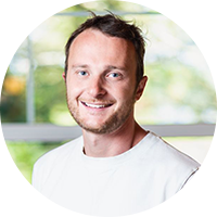 Photo of a business man wearing a white shirt