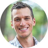 a headshot of a young white professional